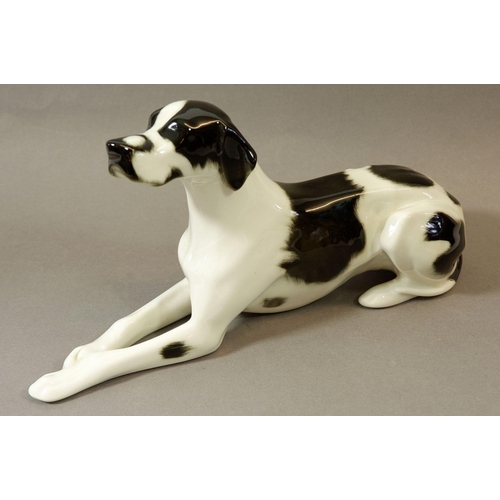 76 - A Lomonosov porcelain dog, 28cm long