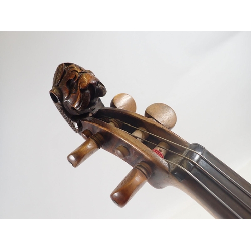 785 - An antique violin with lion head scroll, signed, 14