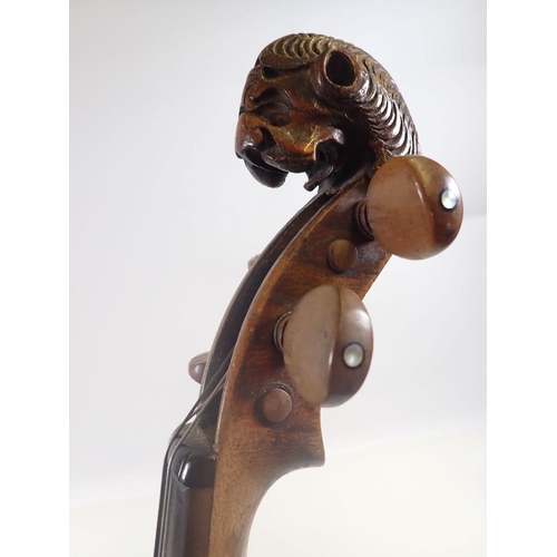 785 - An antique violin with lion head scroll, signed, 14