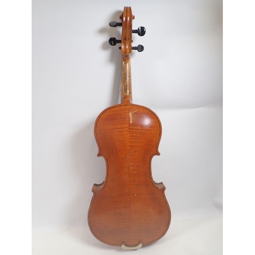 786 - A full size violin with label by Stainer, with bow in case