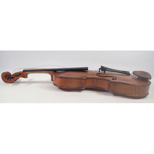 786 - A full size violin with label by Stainer, with bow in case