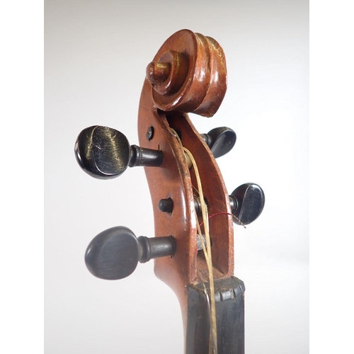 786 - A full size violin with label by Stainer, with bow in case