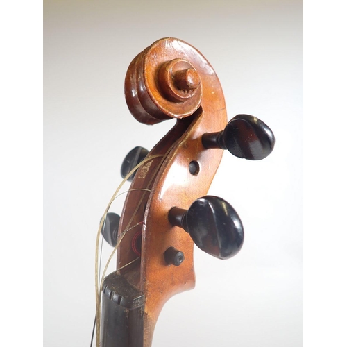 786 - A full size violin with label by Stainer, with bow in case