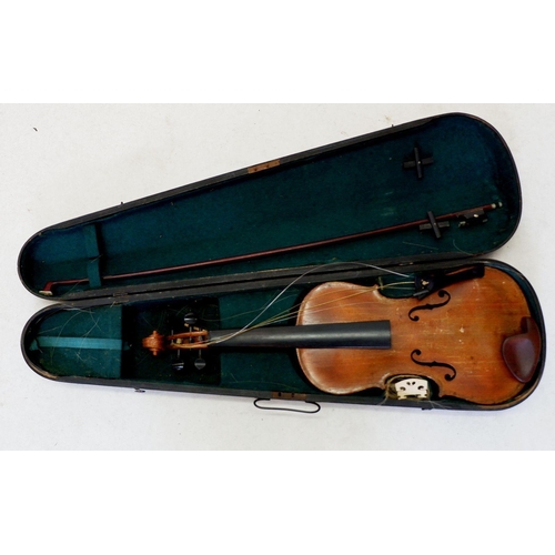 786 - A full size violin with label by Stainer, with bow in case