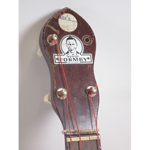 790 - A George Formby ukulele banjolele in case