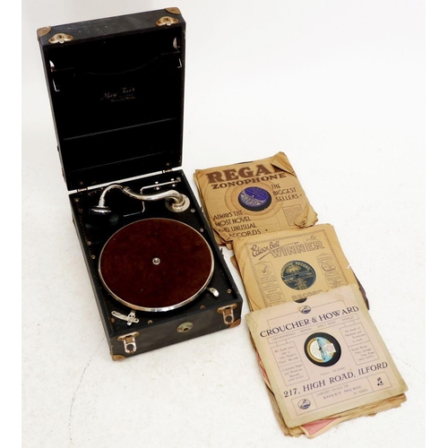 795 - A portable gramophone and 78 rpm records