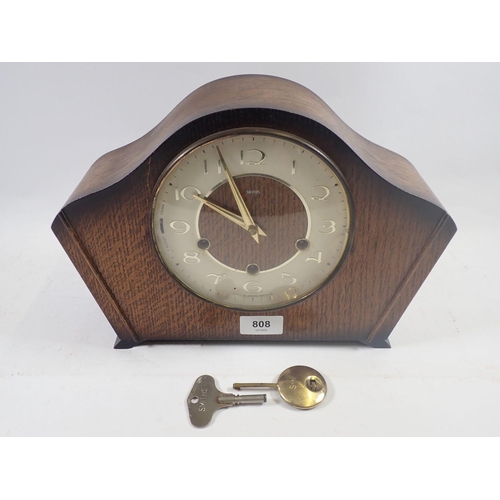 808 - A Smiths oak striking mantel clock