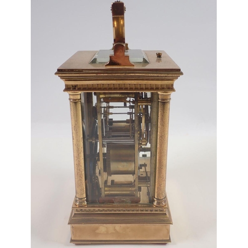 819 - A Victorian brass carriage clock with four columns and repeater striking movement, 16cm to top of ca... 