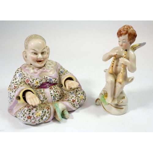 86 - A nodding head figure of a Chinese man with anchor mark to base and a Capodimonte figure of a cherub... 