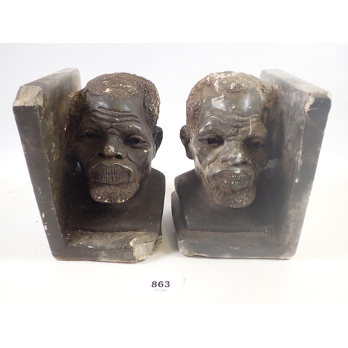 863 - A pair of Aboriginal stone bookends, 16cm tall