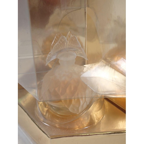 873 - A Lalique set of three miniature perfume bottles 'Les Facons' collection