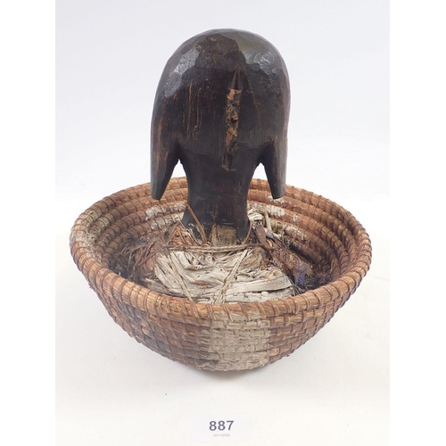 887 - A Karabon tribal reliquary figure and basket