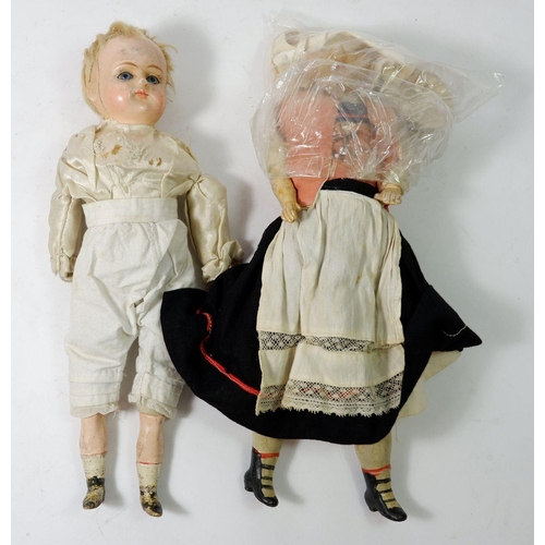 905 - A Victorian composite doll with fabric body and a Victorian wax doll (head a/f) with fabric and wood... 