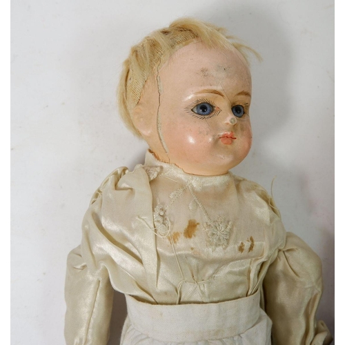 905 - A Victorian composite doll with fabric body and a Victorian wax doll (head a/f) with fabric and wood... 