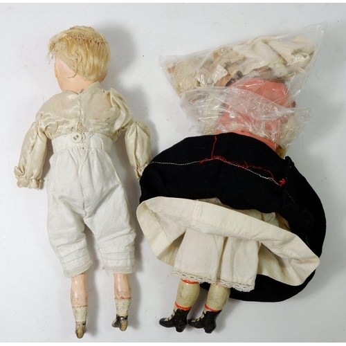 905 - A Victorian composite doll with fabric body and a Victorian wax doll (head a/f) with fabric and wood... 