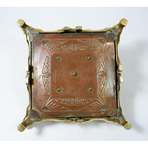 938 - A brass and copper Art Nouveau style inkwell 19cm square