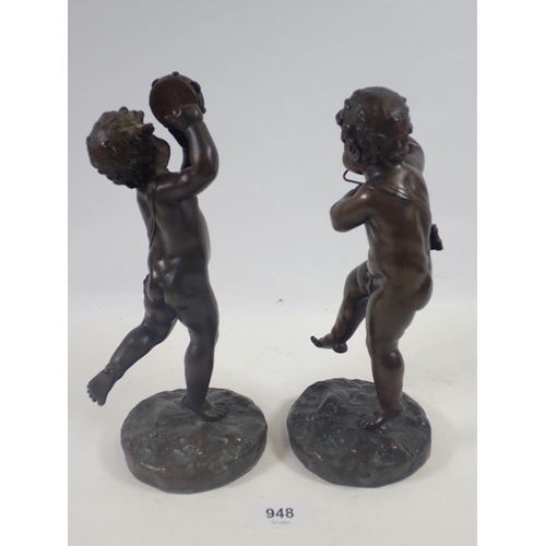 948 - A pair of 19th century bronze figures of putti playing the tambourine and triangle after Clodion, 23... 