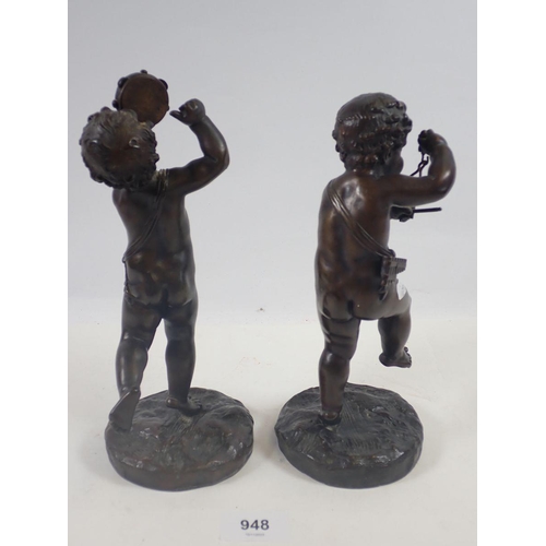 948 - A pair of 19th century bronze figures of putti playing the tambourine and triangle after Clodion, 23... 