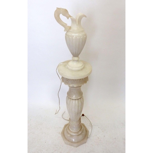 988 - An alabaster torchere stand with ewer form illuminated alabaster lantern, 107cm tall