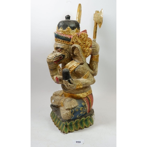 996 - A large Balinese painted and carved elephant god figure, 45cm