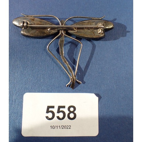 558 - A sterling silver dragonfly brooch with butterfly wing inserts, 3.8cm long