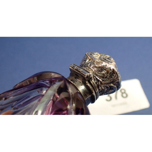 378 - A miniature Victorian purple flashed and cut glass scent bottle with embossed silver lid, 7cm, unmar... 