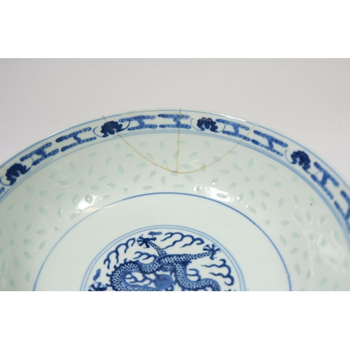 103 - A late Qing dynasty blue and white rice bowl, damaged, 23cm diameter