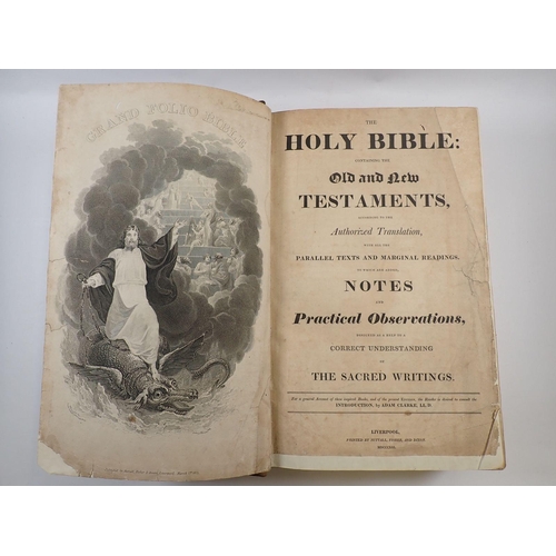 1052 - A large leather bound bible with comments by Rev S Clarke, published 1813