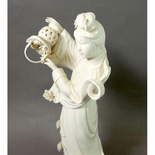 110 - A Chinese modern Blanc De Chine figure of a  lady, 37cm tall
