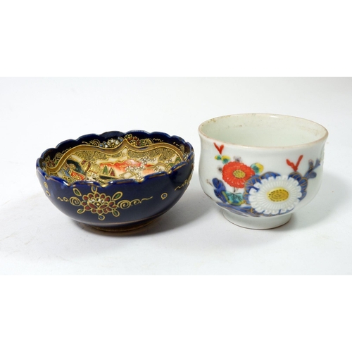 111 - A Japanese satsuma tea bowl and another Japanese tea bowl decorated flowers
