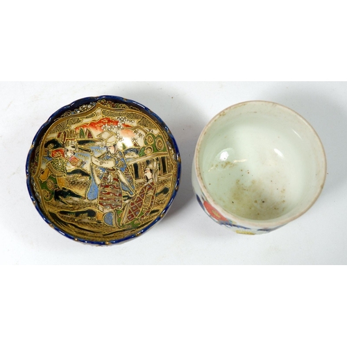 111 - A Japanese satsuma tea bowl and another Japanese tea bowl decorated flowers