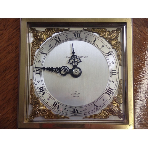 1110 - A Mappin & Webb Elliott mahogany mantel clock, 14cm tall