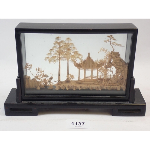 1137 - A Chinese carved cork picture in ebonised and glazed frame, 14.5cm high