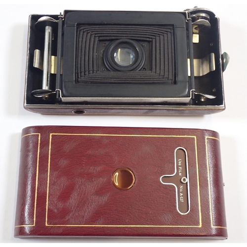 1174 - A Kodak Vanity III series red cased pocket camera and case