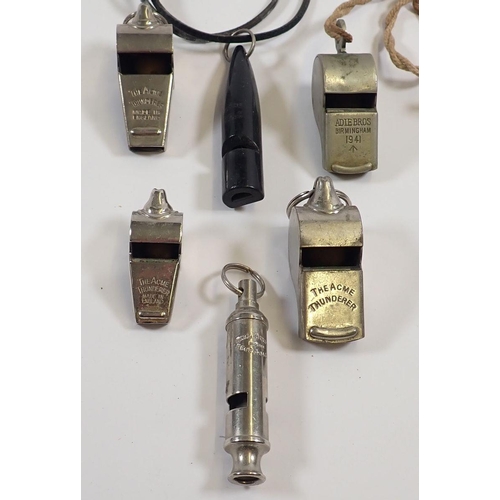 1182 - A 1941 military Adie Bros whistle, four various Acme whistles including 3 Thunderer examples and a G... 