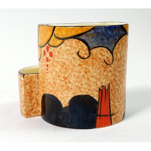 129 - A Clarice Cliff cigarette and match holder marked Cafe au Lait, Bizarre, Newport Pottery