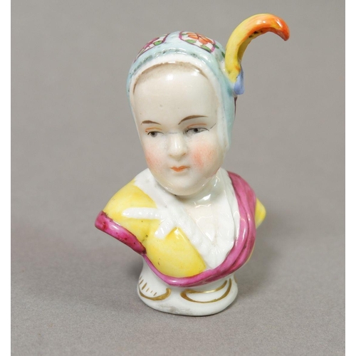 131 - A Höchst porcelain bust of a girl with feather in her cap, 6.5cm