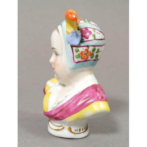 131 - A Höchst porcelain bust of a girl with feather in her cap, 6.5cm