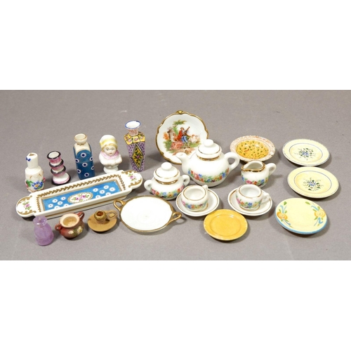 138 - A collection of miniature or dolls house porcelain including vases, tea set, plates etc.