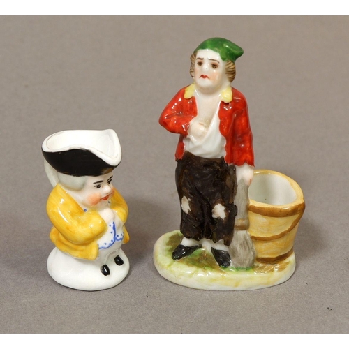 142 - A Derby S & H miniature toby jug and a miniature of a man with bucket and broom, 6.5cm