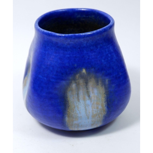 146 - A Ruskin lapis blue vase with indented sides, 10.5cm, 1927