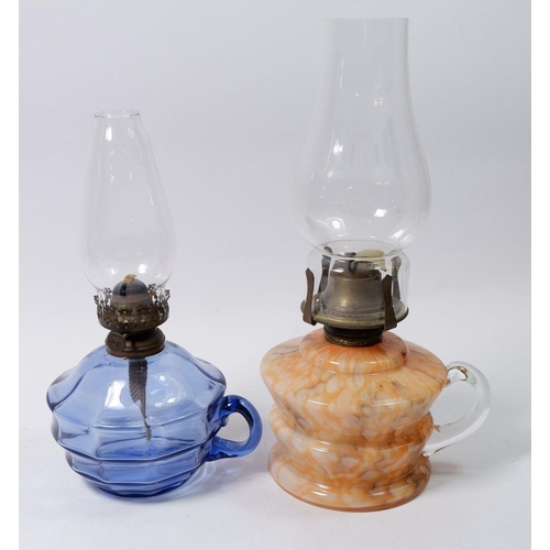 158 - A Victorian mottled orange glass finger lamp and a blue glass one