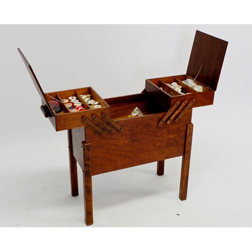 1601 - A retro cantilever sewing box with contents