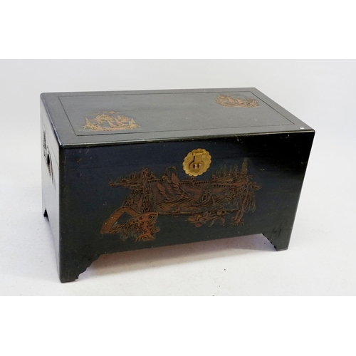 1603 - An Oriental carved camphor wood chest, 100cm L x 58cm H