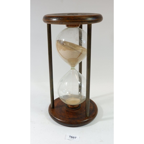 1607 - A large sized wooden and glass egg timer, 34cm