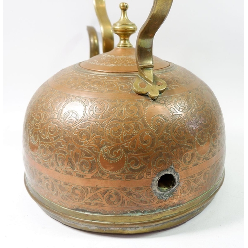 1608 - A large copper Eastern kettle with all over engraved decoration and interior pipe to base and side, ... 