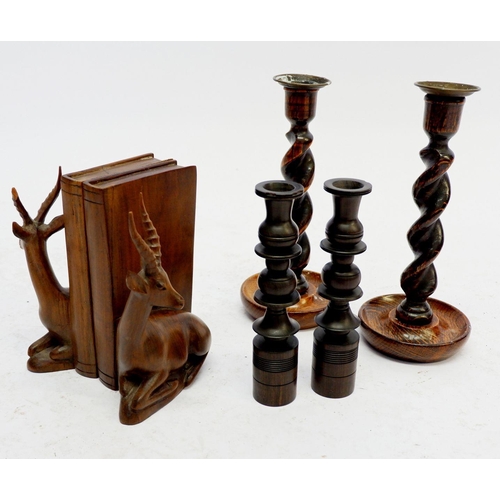 1611 - A pair of early 20th century barleytwist candlesticks, a pair of turned hardwood candlesticks, 19cm ... 