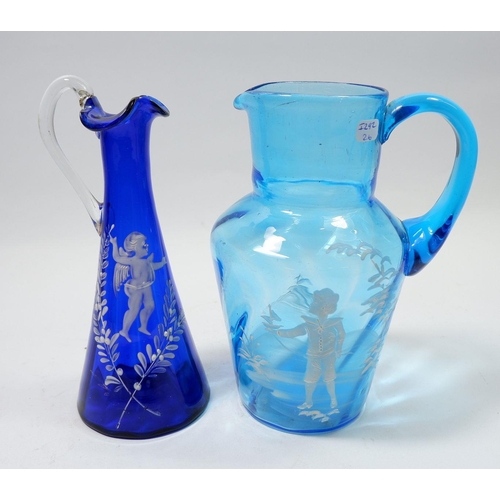 164 - A Mary Gregory style turquoise glass jug painted boy with boat, 18cm and a blue jug painted cherub