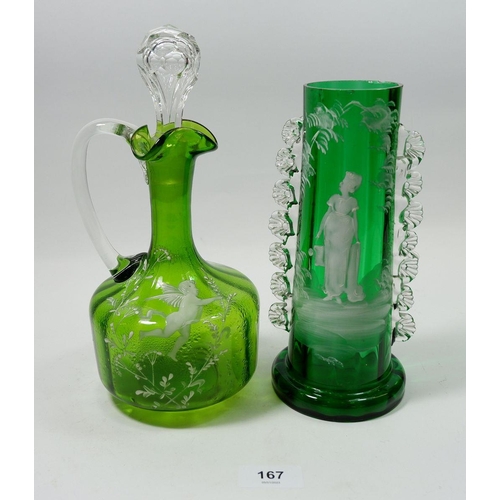 167 - A green Mary Gregory style glass vase painted woman with watering can, 22cm tall and a green claret ... 