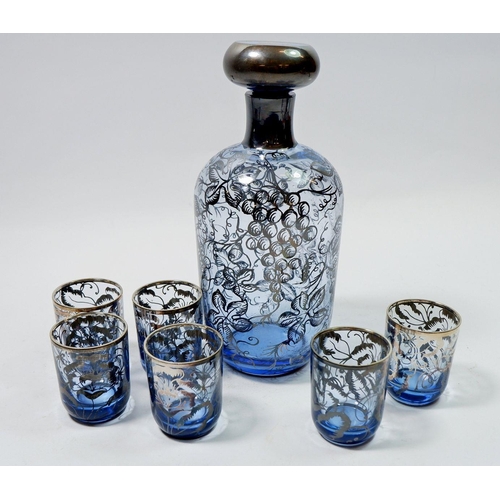 169 - A 1920's blue glass liqueur decanter and six glasses with silvered vine decoration